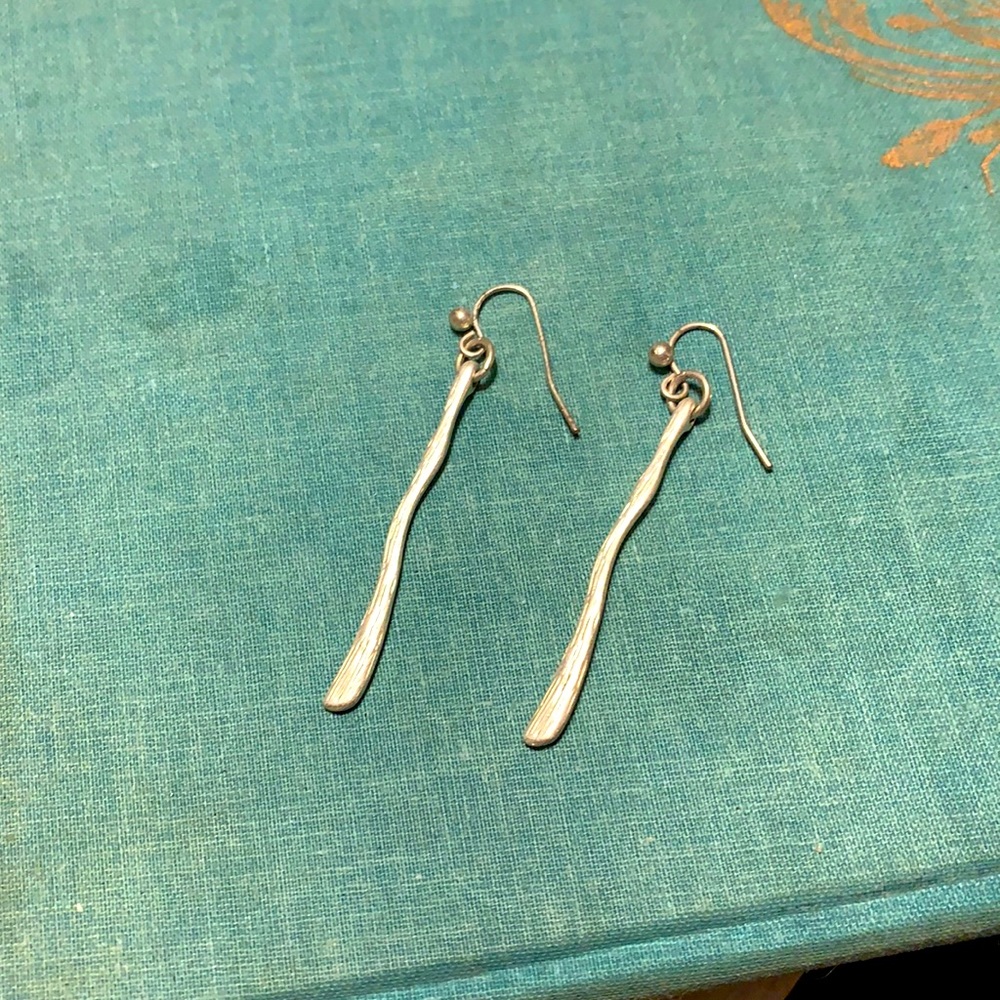 Textured silver costume earrings
